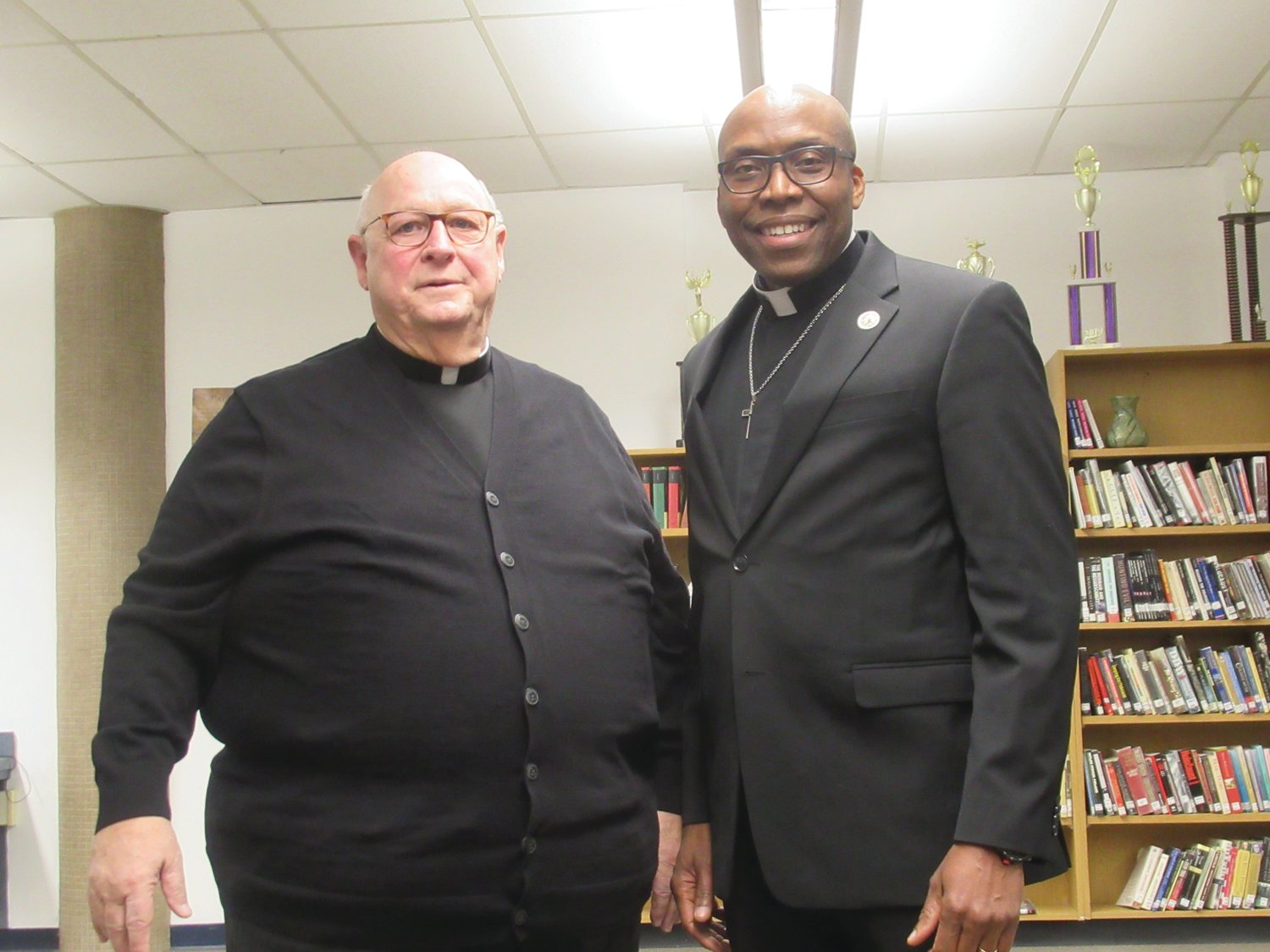 PASTORS: Rev. Peter J. Gower of Our Lady of Grace Church delivered the Innovation Monday night and Rev. Chris Abhulime of King’s Tabernacle Church delivered the evening’s benediction.
